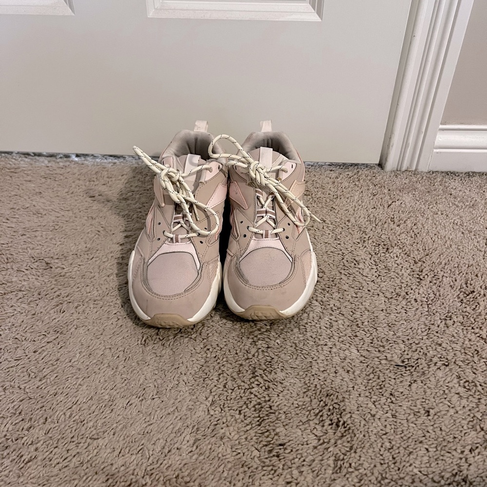 Pastel pink Reebok Aztecs